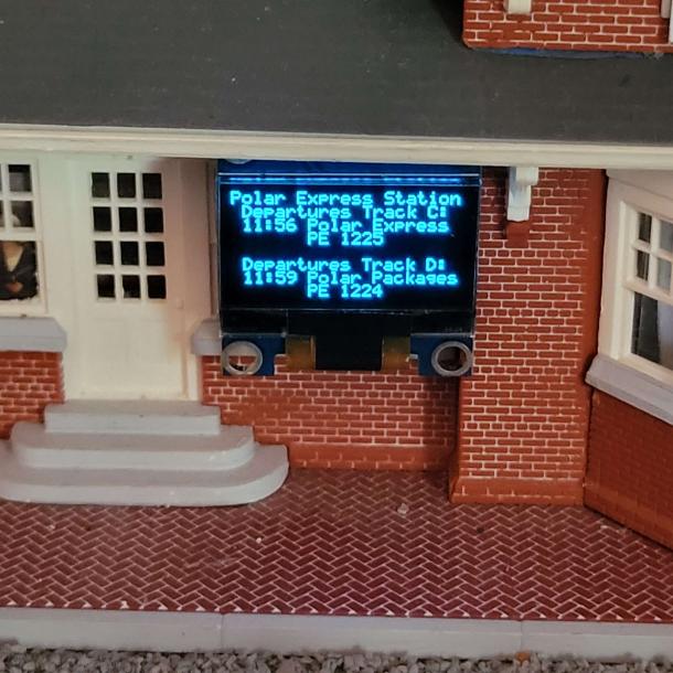 OLED showing train departure times