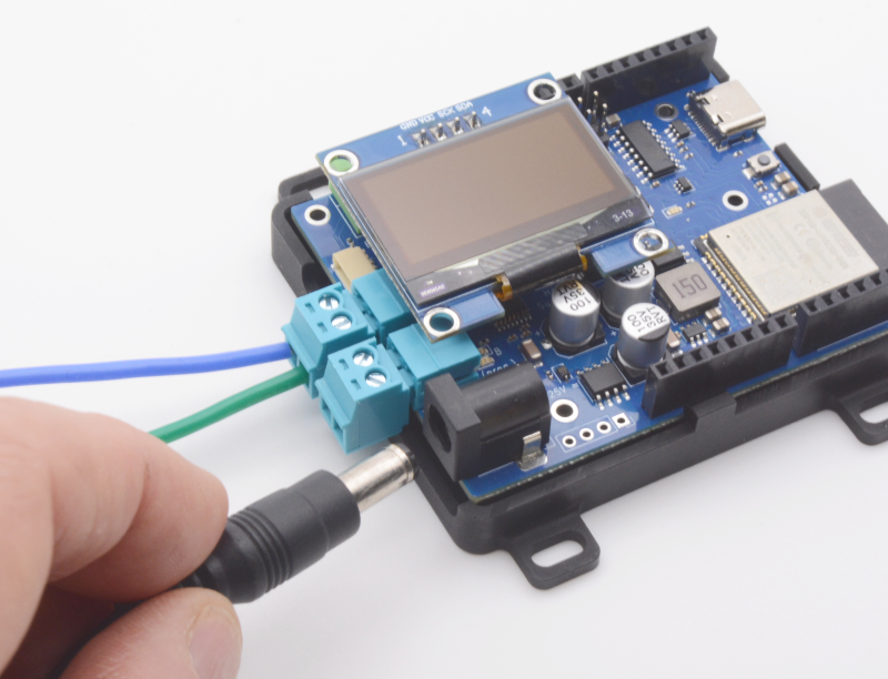 Inserting Power Supply Barrel Plug
